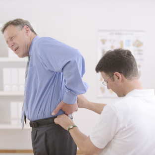 back pain in the lumbar region of the treatment